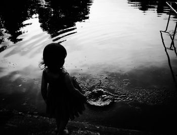 Reflection of woman in water