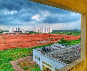 High angle view of buildings against sky