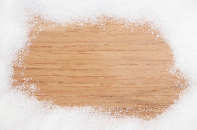 High angle view of coffee beans against white background