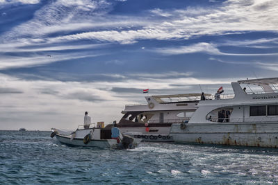 Nautical vessel on sea against sky