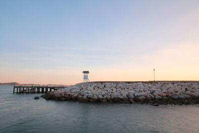 Scenic view of sea against sky during sunset