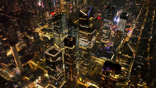 High angle view of illuminated cityscape at night, new york city skyline