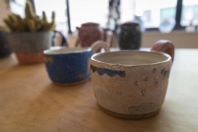 Close-up of coffee cup on table