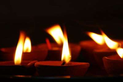 Close-up of illuminated candles