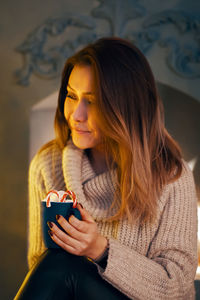 Young woman using mobile phone