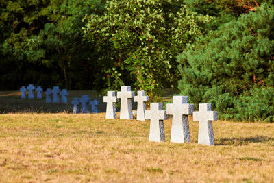 Catholic granite stone crosses in german military cemetery in europe. memorial for dead soldiers