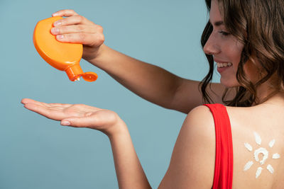 Portrait of woman holding ice cream