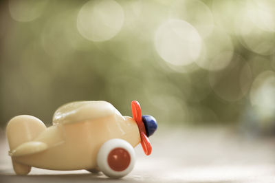 Close-up of toy airplane on table