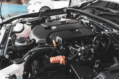 High angle view of car engine in garage