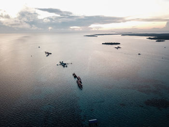 Aerial view of beautiful landscape near the island water village during sunrise.