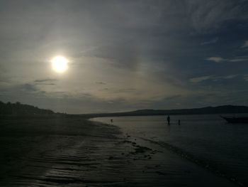 Scenic view of sea against sky at sunset