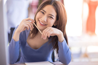 Portrait of a smiling young woman