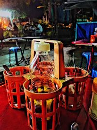 Close-up of wicker basket on table at sidewalk cafe