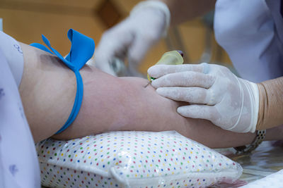 Midsection of man lying down