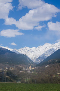 Scenic view of snowcapped mountains against sky