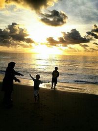 Scenic view of sea at sunset