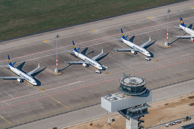 High angle view of airplane on airport runway