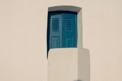 Low angle view of closed door of building