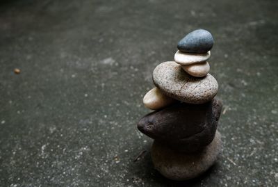 Close-up of stone stack on rock