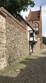 Footpath by old building