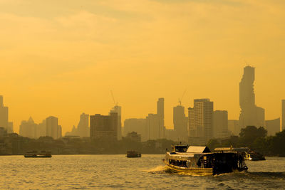 View of buildings against sky during sunset