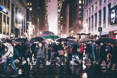 People on wet street in rain