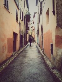 Narrow alley along buildings