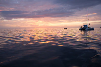 Scenic view of sea at sunset