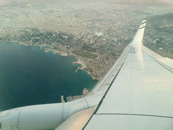 Aerial view of city against sky