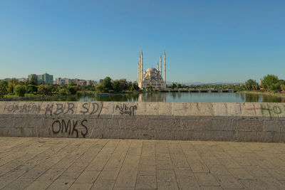 View of built structures against clear sky