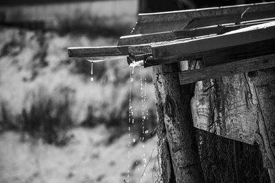 Close-up of water drops on metallic structure