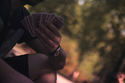 Close-up of woman holding hands