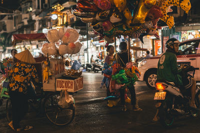 People on street at night