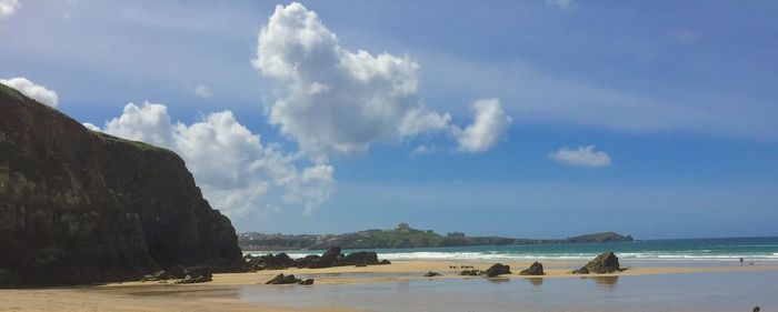 Panoramic view of beach against sky