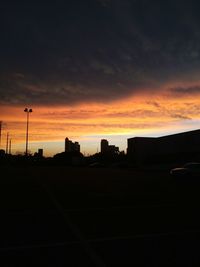 Silhouette of buildings at sunset