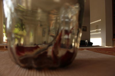 Close-up of glass jar on table