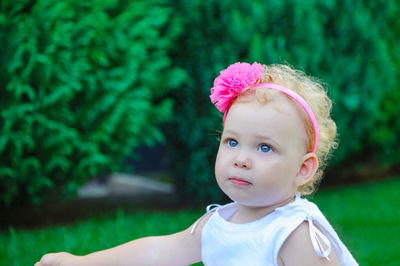 Portrait of cute girl looking away