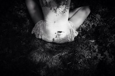 Close-up of woman standing in pond