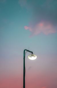 Low angle view of street light against sky during sunset