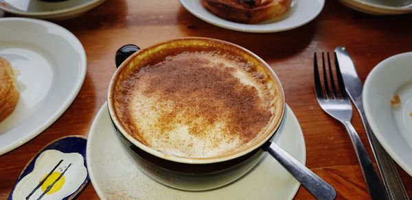 High angle view of cup of capachino 