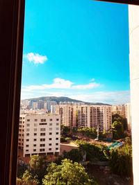 Buildings against blue sky