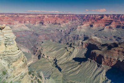 Aerial view of landscape with mountain range in background