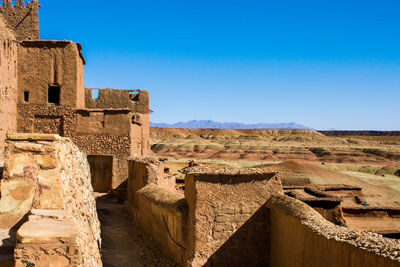 Old ruins against clear blue sky