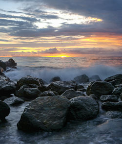 Scenic view of sea against sky during sunset