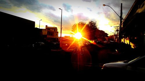 Sun shining through buildings