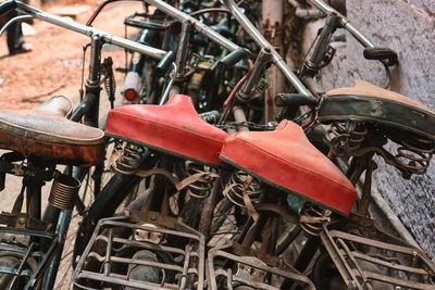 Close-up of abandoned bicycles