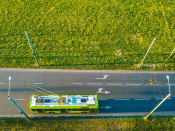 High angle view of bus on road amidst landscape