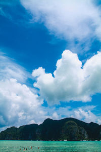 Scenic view of sea against cloudy sky