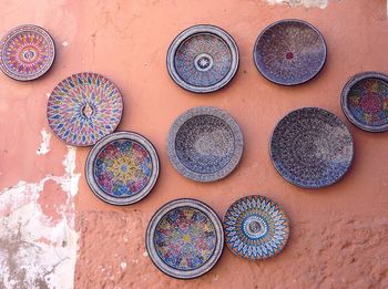 Plate with handicraft displayed on wall