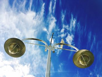 Low angle view of street light against sky